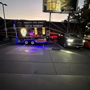 a taqueria truck parked in a parking lot