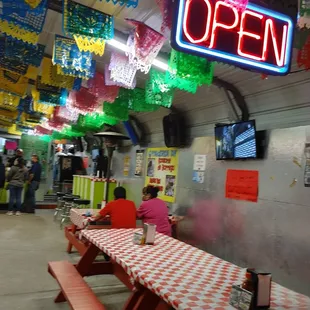 a restaurant with tables and benches
