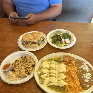 Bean and cheese Pupusas, carne asada torta and verde Enchiladas