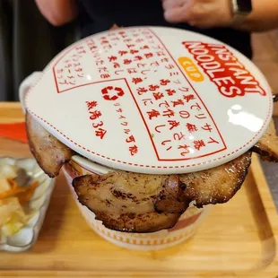 a plate of food on a tray