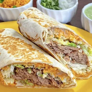 Combo Big  Burrito. 1lb full of flavor.! rice, beans, lettuce, cheese, sour cream and your favorite protein.