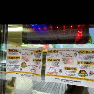 menus on the window of a fast food restaurant