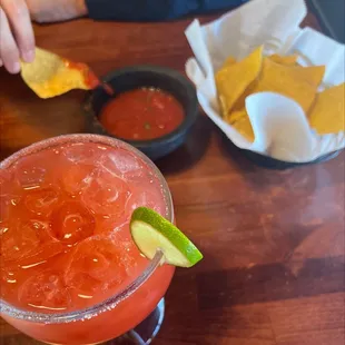 Strawberry margarita and chips and salsa