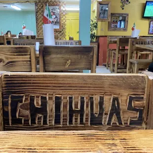 a table and chairs in a restaurant