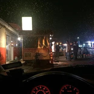 The side of the food truck. Check out the line.