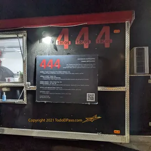 a man behind a food truck