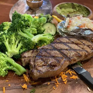 Ribeye w/ broccoli, a baked potato, and a small salad. Bomb