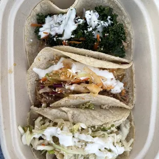 Pork tacos with all three slaws (kimchi was my favorite!)