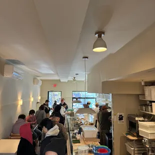 people in a restaurant kitchen