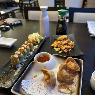 Sexy devil roll, crab  wontons, salmon tempura (on the house )