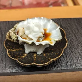 Oyster with yuzu foam