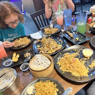 Shrimp fried rice, Pork belly ramen, shrimp dumplings, soup dumplings, crab jalapeño and crab Rangoon