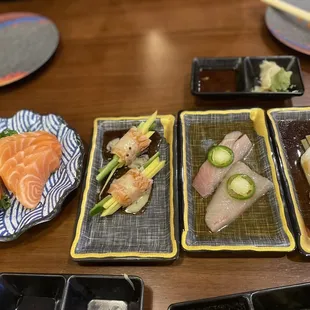 Salmon, apps selection from sushi bar