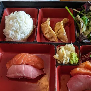 Lunch Bento with sushi and sashimi