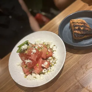 Watermelon salad , salmon on the side . Yum