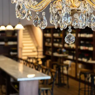 a chandelier in a wine shop