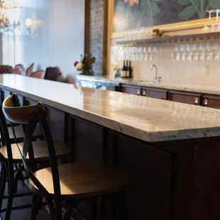 a bar with a marble counter top