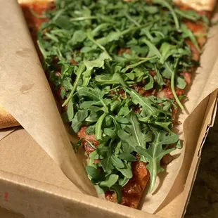 Pepperoni, sausage and arugula.