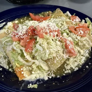 Enchiladas Supreme (one chicken, one ground beef, one cheese and one bean) choice of Red or Green sauce.