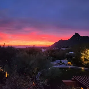 a sunset view of the mountains