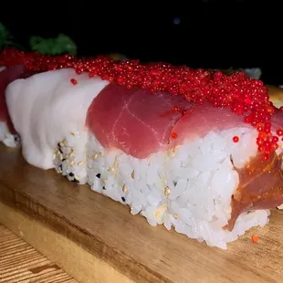 a sushi roll on a cutting board