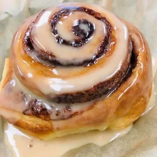 Giant cinnamon roll with coffee maple glaze