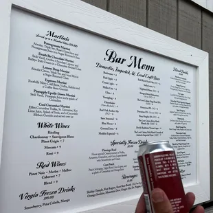 a beer can and menu