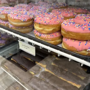 pink frosted donuts with sprinkles