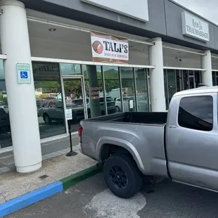 No permanent sign yet. But look for the banner. Dominos pizza is also on the right of them.