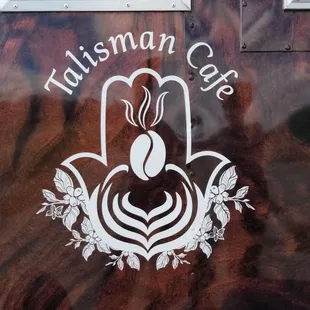 the logo on the side of a food truck