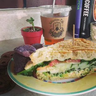 a sandwich and chips on a plate