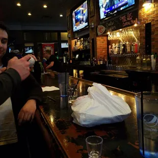 a man sitting at a bar
