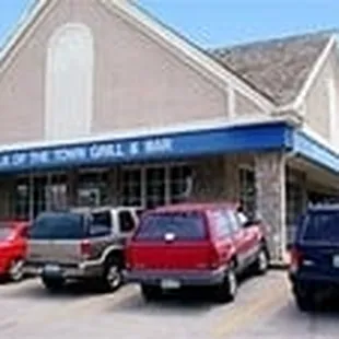 cars parked in front of a building