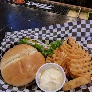 50/50 burger and waffle fries. Great bun and awesome fries