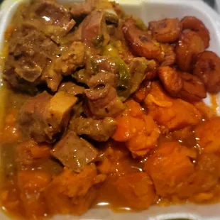 Curry goat, candies yams and Plantains