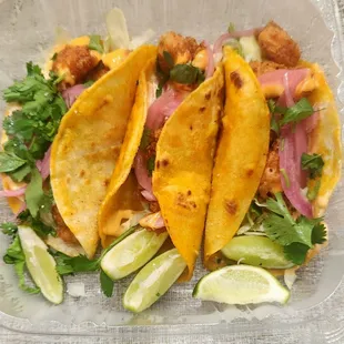 Bang, bang shrimp tacos, $12.99. Shells are too soft.  Dining in with this entree might be better.