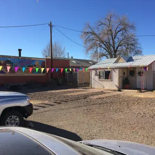 Can't miss it if you look for the artists design on the building to the left of this Awesome Coffee Shop!!  Flags are up for moment.