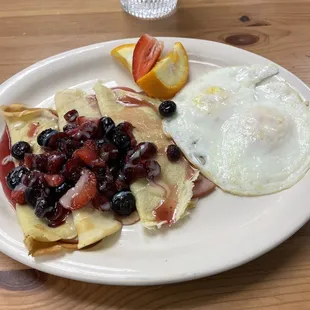 Wild berry crepes with Canadian bacon and eggs. Only in the breakfast secret menu.