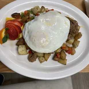 Midland are skillet braised beef, fried potatoes, onions, bell peppers with your style of fried egg on top. Very delicious.