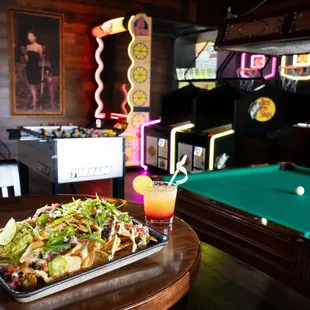 Snack while you play billiards, arcade games and more.