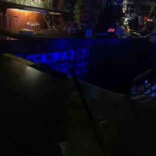 a bar with a blue light