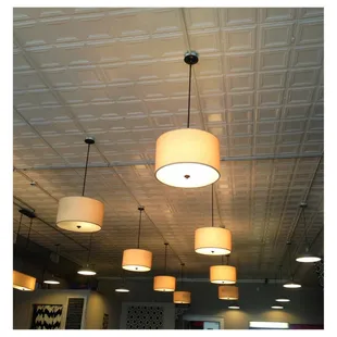 several lamps hanging from the ceiling