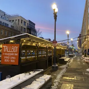 a train on the tracks in the snow