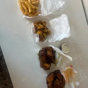 Fries, fried pickles, buffalo and lemon pepper wings