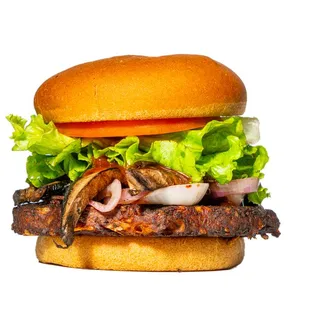 a hamburger with meat, onions, lettuce, and tomato