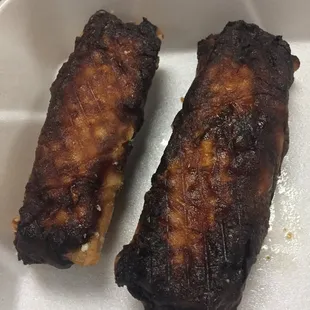Ordered the spring rolls to go. Called and complained and was advised they are supposed to look like that. They were rock hard and black.