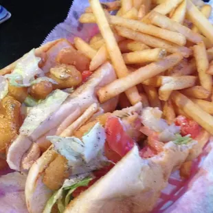 Shrimp Po Boy and fries. Washed it down with a cold Bud Light.