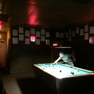 a man playing pool