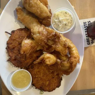 Three foot long pieces of beer battered cod and 2 huge potatoe pancakes