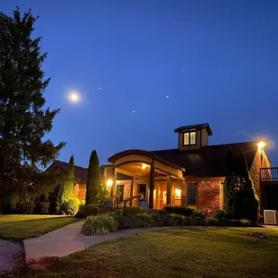 the front of the winery at night